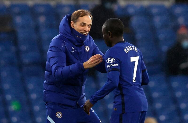 Chelsea manager Thomas Tuchel greets Chelsea's N'Golo Kante after the final whistle during the Premier League match at Stamford Bridge, London. Picture date: Monday February 15, 2021. PA Photo. See PA story SOCCER Chelsea. Photo credit should read: Adrian Dennis/PA Wire. RESTRICTIONS: EDITORIAL USE ONLY No use with unauthorised audio, video, data, fixture lists, club/league logos or "live" services. Online in-match use limited to 120 images, no video emulation. No use in betting, games or single club/league/player publications.