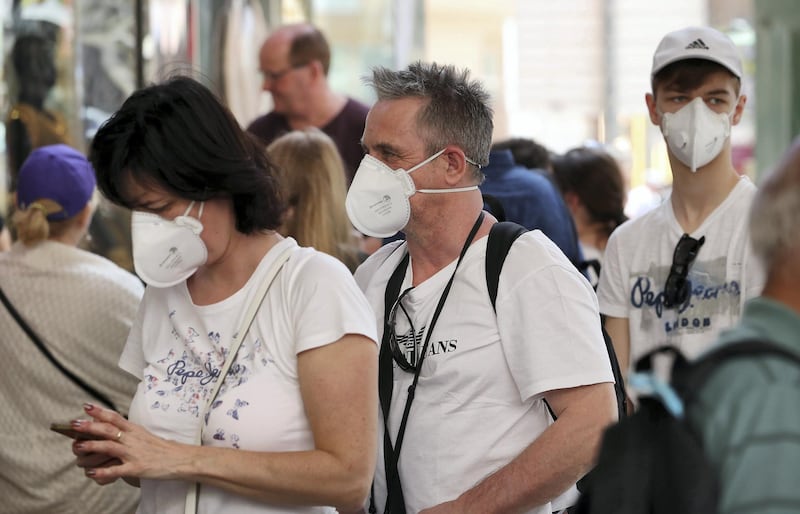 DUBAI , UNITED ARAB EMIRATES , Mar 10 – 2020 :- Tourists wearing protective face mask at the Dubai Gold Souk in Deira Dubai. ( Pawan Singh / The National ) For News/Online Story by Kelly