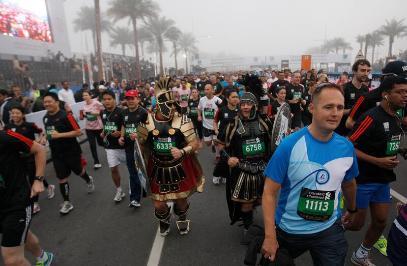 Dubai, United Arab Emirates, Jan 25 2013, 2013 Standard Chartered Dubai Marathon, 10K Run- thousands of Runners in the 10K , some dressed in costumes  in the Standard Chartered Dubai Marathon, Jan 25, 2013.  Mike Young / The National

