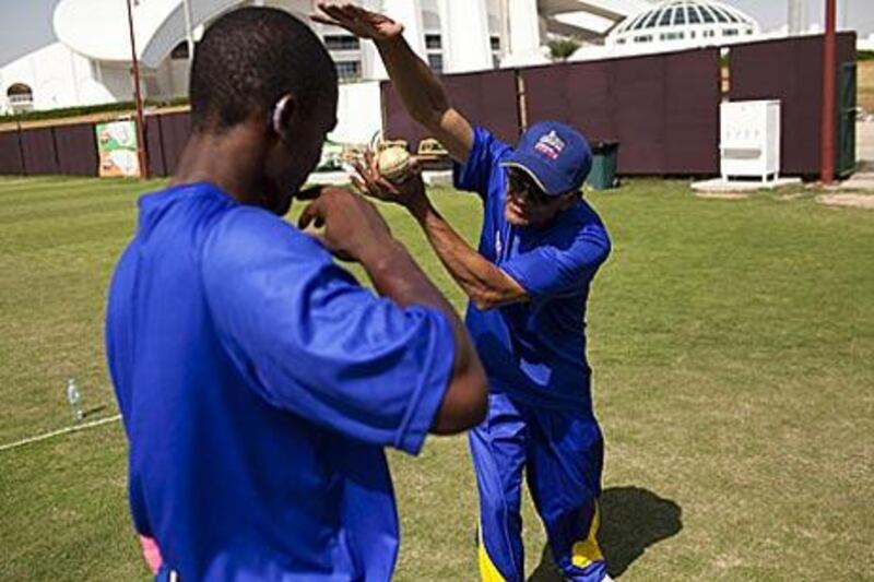 South Africa's first non-white international player, Omar Henry, is now working hard teaching cricket to children of all colours.