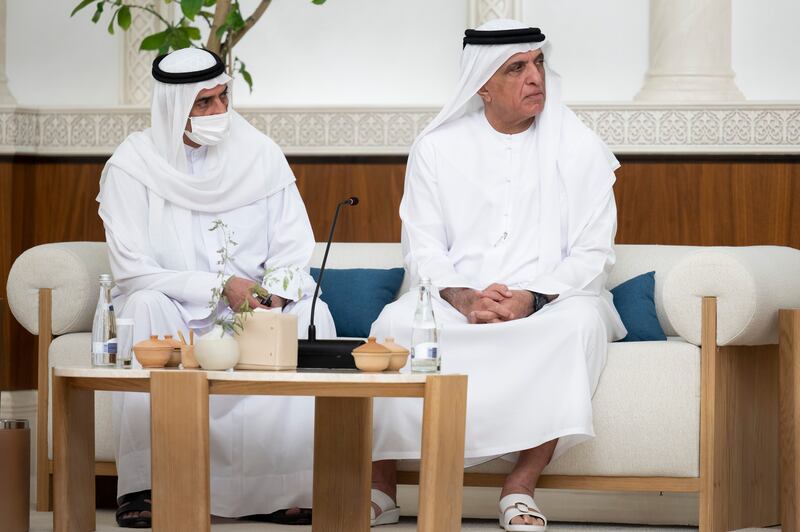 Sheikh Hamad and Sheikh Saud follow proceedings.