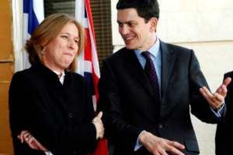 Israeli Foreign Minister Tzipi Livni (L) meets with her British counterpart David Miliband in Jerusalem, 18 November 2007. British and French foreign ministers met Israeli and Palestinian leaders today in a bid to boost the chances of success at a US-sponsored Middle East peace meeting later this month. The flurry of diplomacy came amid lowered expectations for the conference planned in Annapolis, Maryland in late November with the aim of kickstarting long-dormant Israeli-Palestinian peace talks. AFP PHOTO / MENAHEM KAHANA