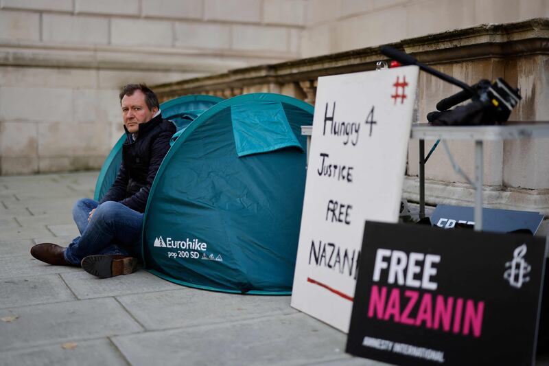 Richard Ratcliffe, husband of Nazanin Zaghari-Ratcliffe, a British-Iranian detained in Iran since 2016, sits in a tent outside the Foreign Office in London after beginning a hunger strike. AFP