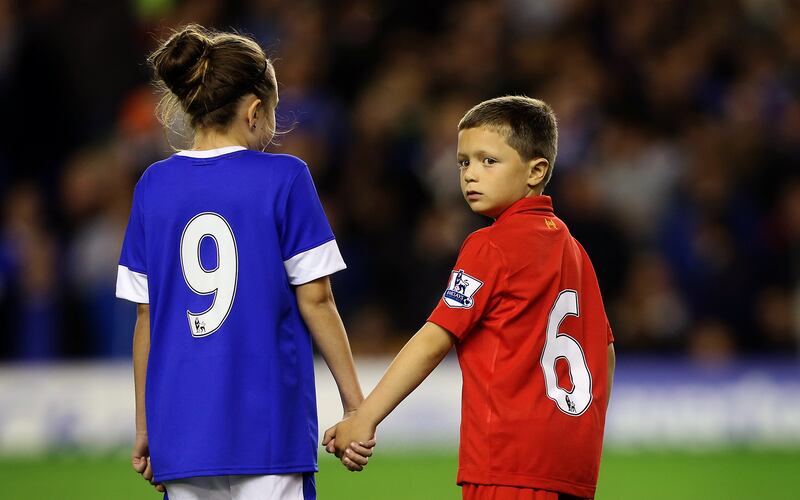 Two mascots walked out into the middle of the pitch in club colours for the Hillsborough tragedy tribute ahead of Merseyside derby between Everton and Liverpool. 17/09/2012. Lee Smith / FPA / LDY Agency