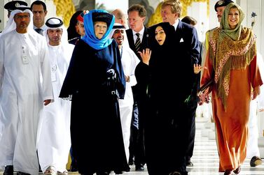 Dutch Queen Beatrix, third from left, visited the Sheikh Zayed Grand Mosque together with then Crown Prince Willem-Alexander and Princess Maxima, far right, now King and Queen of the Netherlands AFP