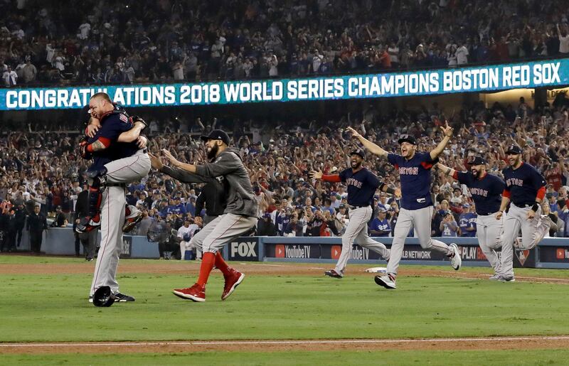 The Boston Red Sox celebrate their World Series win. AP Photo