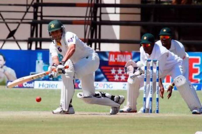 The innings of Pakistan's Younis Khan, left, was patience personified. Tsvangirayi Mukwazhi / AP Photo