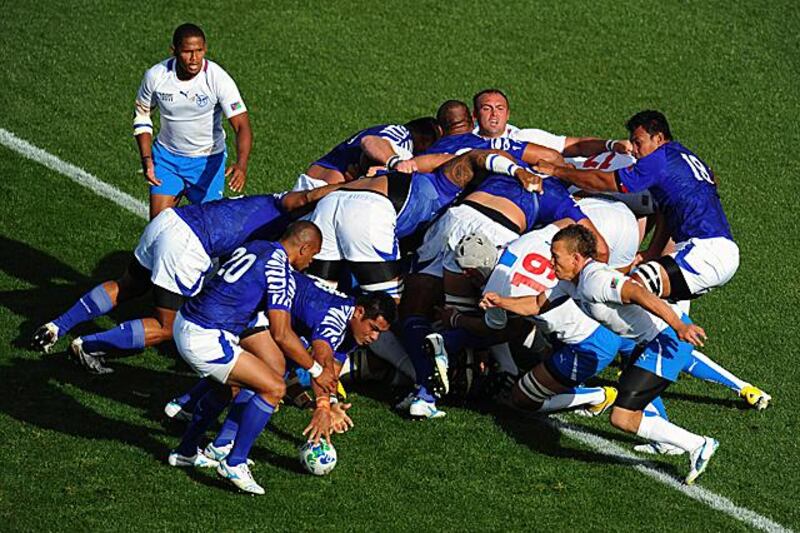 ROTORUA, NEW ZEALAND - SEPTEMBER 14:  Number eight George Stowers of Samoa picks up the ball from the base of a scrum during the IRB 2011 Rugby World Cup Pool D match between Samoa and Namibia at Rotorua International Stadium on September 14, 2011 in Rotorua, New Zealand.  (Photo by Mike Hewitt/Getty Images)