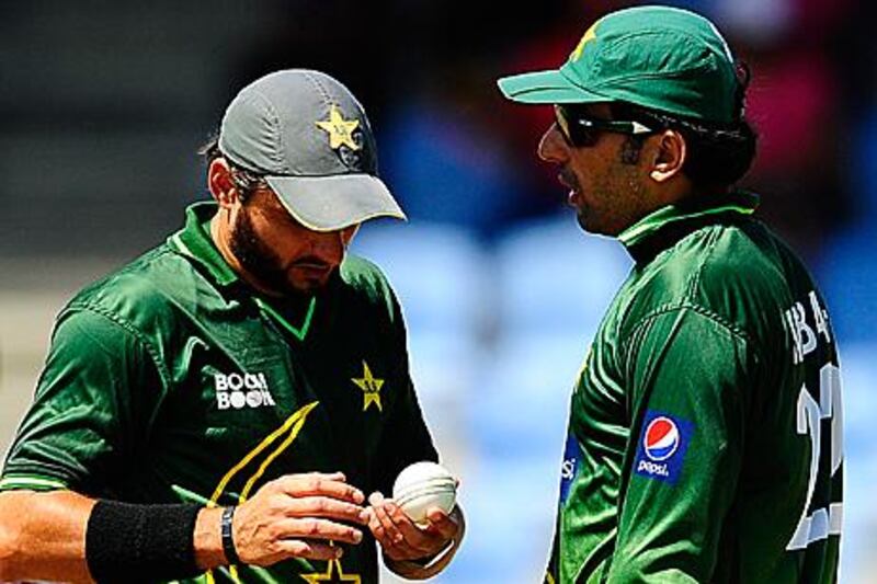 Sources say Shahid Afridi, left, was ignored by Misbah-ul-Haq, right, and Waqar Younis.