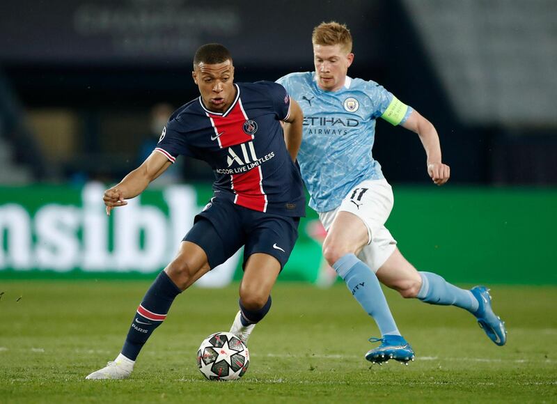 Soccer Football - Champions League - Semi Final First Leg - Paris St Germain v Manchester City - Parc des Princes, Paris, France - April 28, 2021 Paris St Germain's Kylian Mbappe in action with Manchester City's Kevin De Bruyne REUTERS/Benoit Tessier