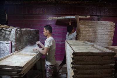 Bakers at work in Cairo. Grain prices have soared in Egypt due to the war in Ukraine. Bloomberg.