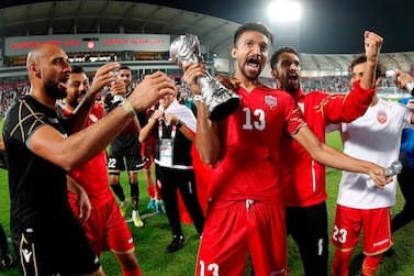 Bahrain's players celebrate after winning the 24th Arabian Gulf Cup Final football match between Bahrain and Saudi Arabia at the Khalifa International Stadium in the Qatari capital Doha on December 8, 2019. / AFP / KARIM JAAFAR