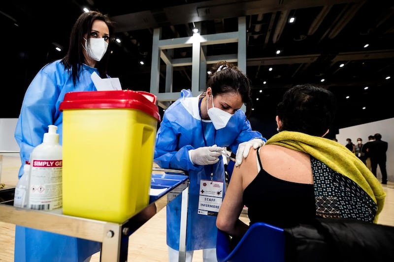 epa09034144 Health personnel carry out vaccination operations to school personnel during the inauguration of the new hub for vaccination against COVID-19, set up by the Local Health Company Asl Roma 2 at the 'La Nuvola' congress center, in Rome, Italy, 24 February 2021.  EPA/ANGELO CARCONI