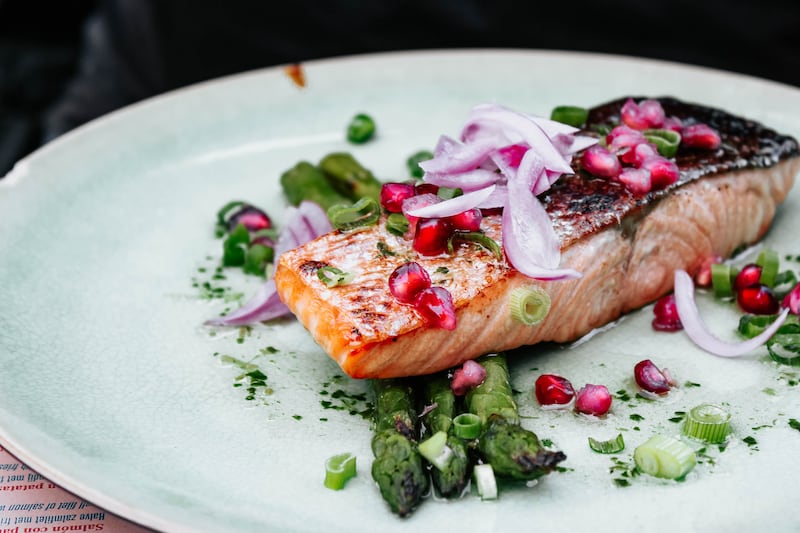 Eating baked salmon can help gain 13.5 minutes. Unsplash