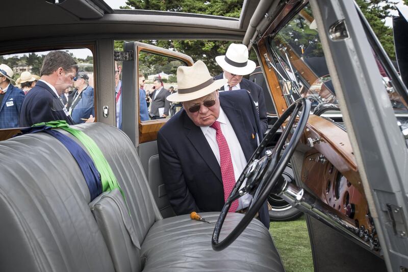 Judges view a 1937 Rolls-Royce Phantom III Barker Sports Saloon. Bloomberg