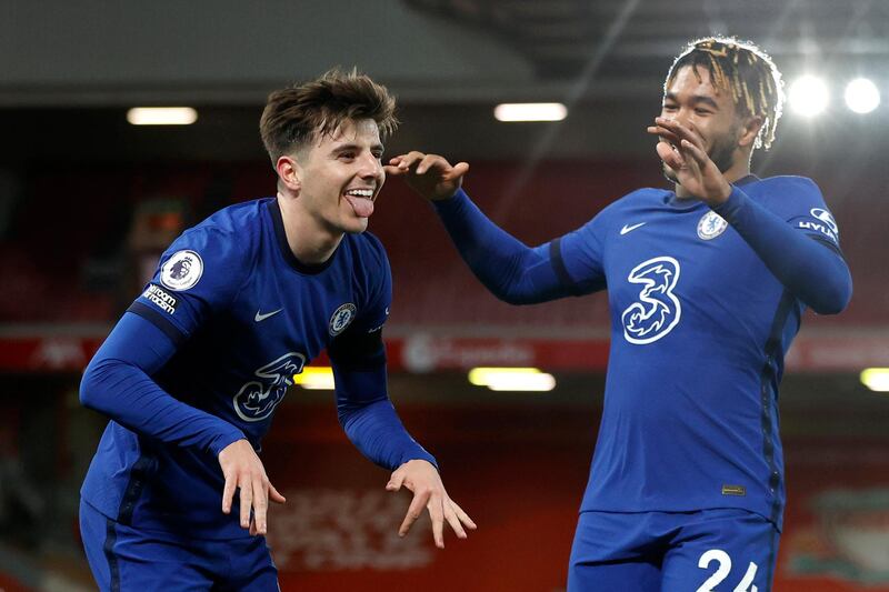 Mason Mount of Chelsea celebrates with teammate Reece James after scoring his team's first goal against Liverpool at Anfield. Getty
