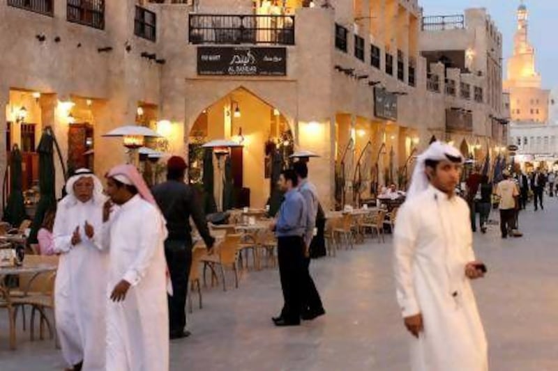 Restaurants and cafes line the street in Doha's Souk Waqif. The growing city also boasts two Gordon Ramsay restaurants. Ryan Carter / The National