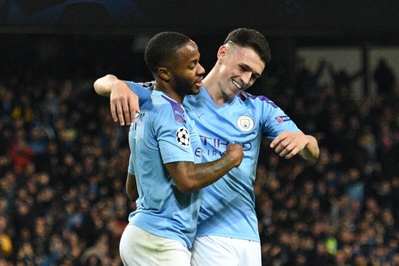 Raheem Sterling and Phil Foden celebrate after Sterling scores Manchester City's fourth goal against Atalanta. AFP