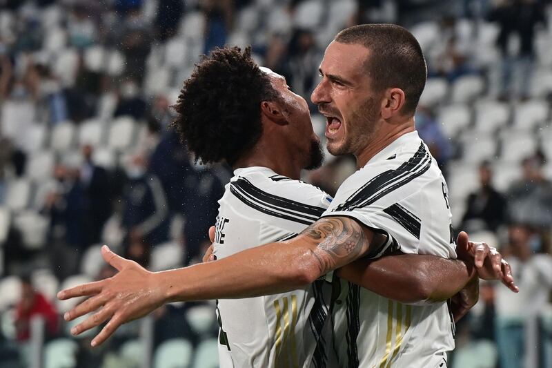 Juventus defender Leonardo Bonucci, right, celebrates with American midfielder Weston McKennie after scoring the second goal. AFP