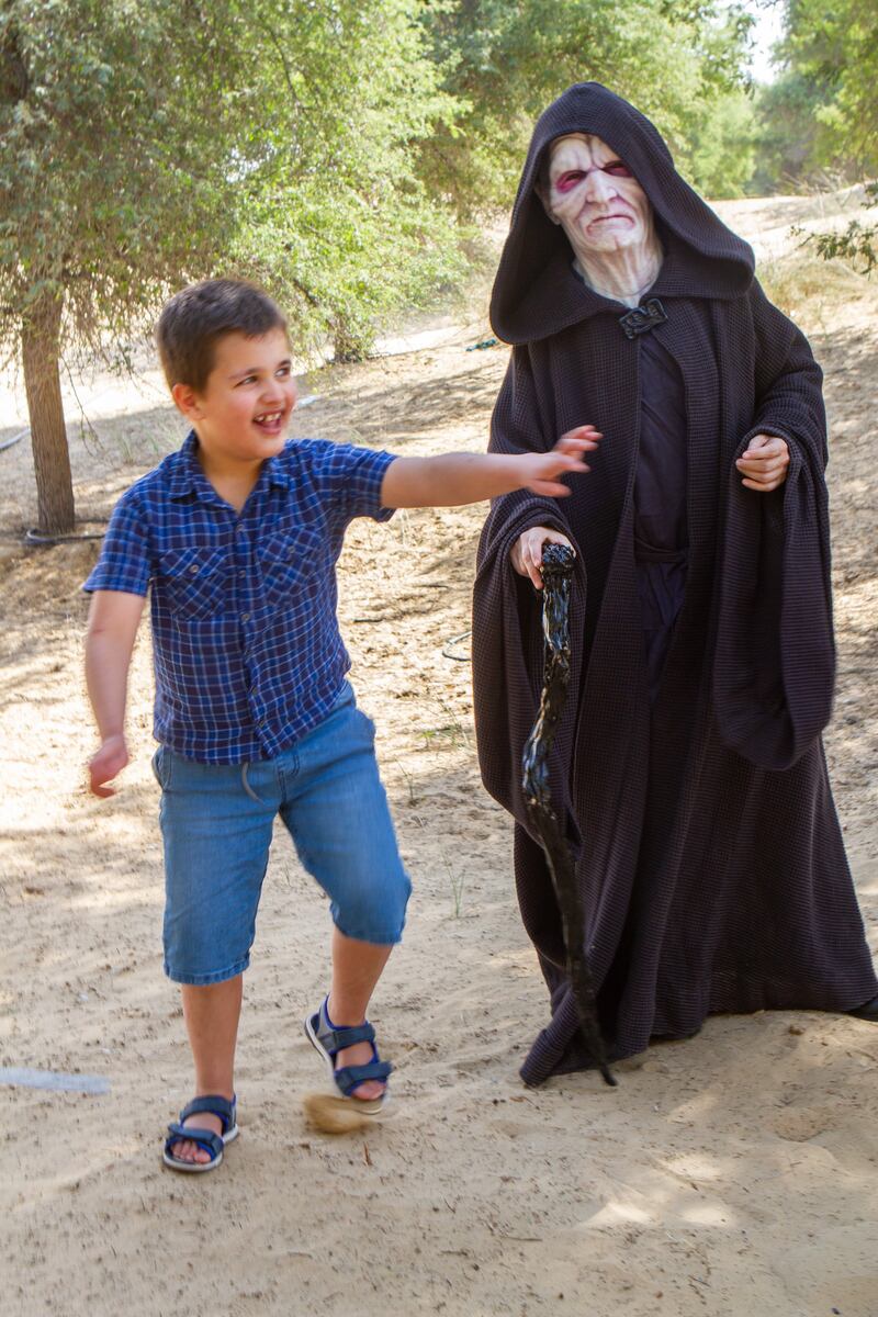 Sam with Beatriz Manzano, from the UAE Garrison, as Emperor Palpatine.