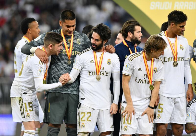 Real Madrid's Isco, Federico Valverde and Alphonse Areola celebrate. Reuters