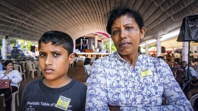 S. D. Suran, 11, and his mother, Swarma Suran, 49, witnessed the suicide bombing in Negombo, Sri Lanka, April 23, 2019. Jack Moore / The National. 


