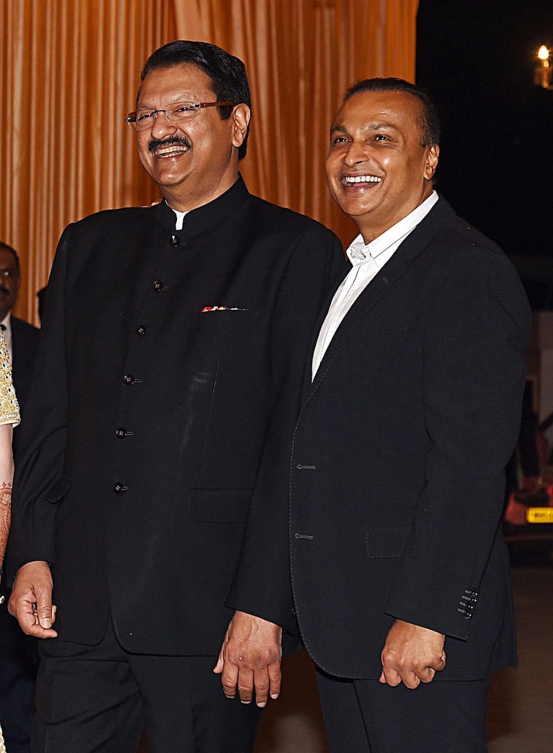 Ajay Piramal  (L) and Anil Ambani (R). Photo: AFP