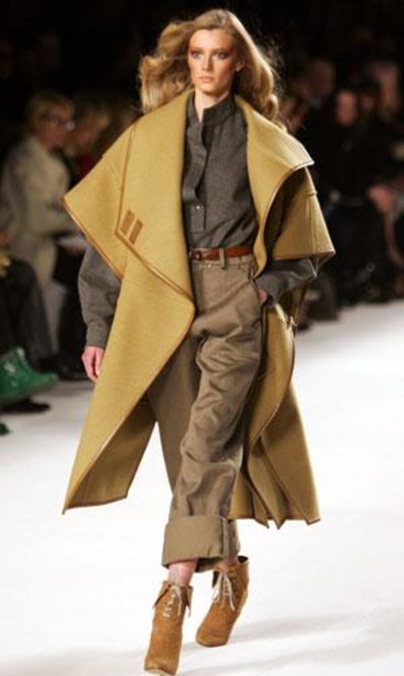 John Galliano, for Christian Dior offered a sharp and militaristic collection.