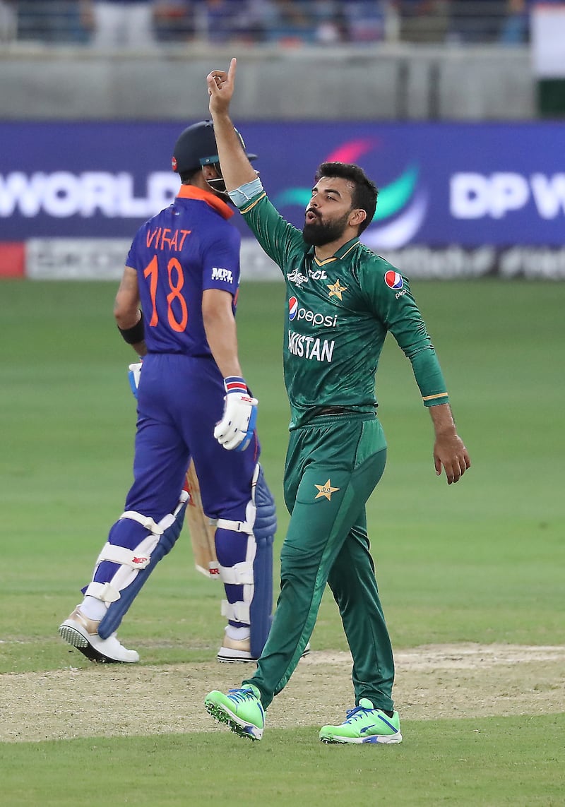 Shadab Khan celebrating after taking the wicket of KL Rahul. Pawan Singh / The National