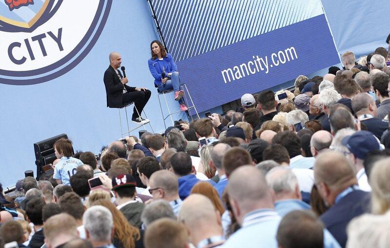 Manchester City manager Pep Guardiola is presented to the fans on Sunday during an event at the City Football Academy. Craigh Brough / Action Images / Reuters