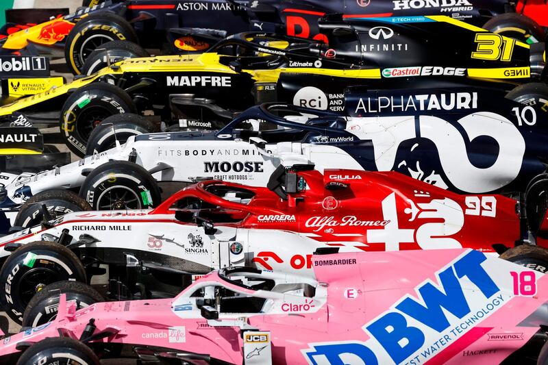 Cars are prepared for inspection after the Formula One British Grand Prix at the Silverstone on Sunday, August 2. AFP