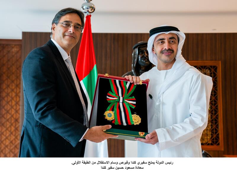 Sheikh Abdullah bin Zayed, Minister of Foreign Affairs and International Co-operation, presents Masud Husain, Canadian ambassador to the UAE, with the Order of Independence First Class. Wam