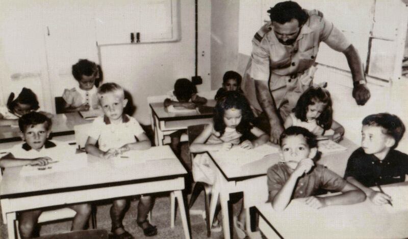 Flight Lt F Loughman and the founding class of Dubai English Speaking School in 1963. The classroom is an upstairs room of a villa where expatriate workers were housed. All photos: Dubai English Speaking School