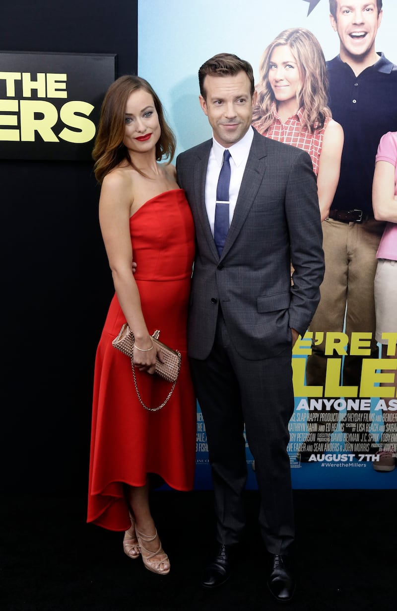 Olivia Wilde, in Osman, and Jason Sudeikis arrive for the US premiere of 'We're The Millers' at The Ziegfeld in New York, on August 1, 2013.