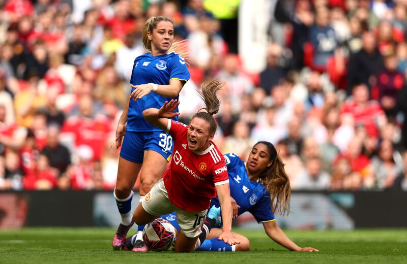 Kirsty Hanson of Manchester United battles for possession with Gabrielle George and Poppy Pattinson of Everton. Getty