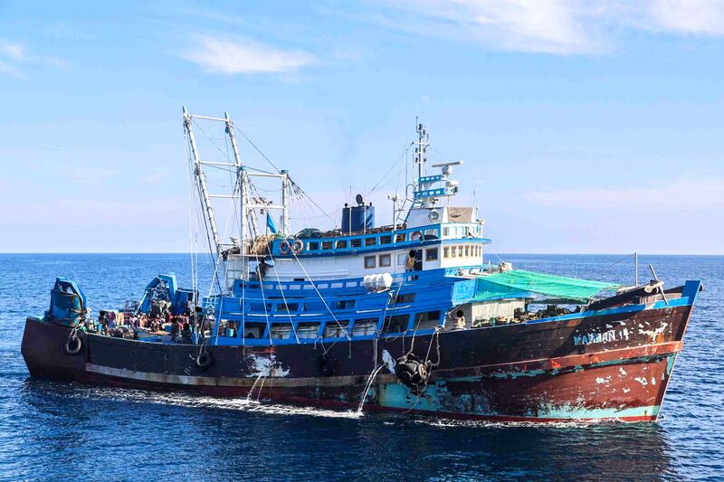 A fishing vessel on a smuggling route between Iran and Yemen was found to be carrying 50 tonnes of bullets and rocket components. All photos: US Navy