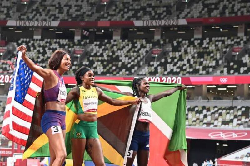 Gold medallist  Jamaica's Elaine Thompson-Herah, centre.