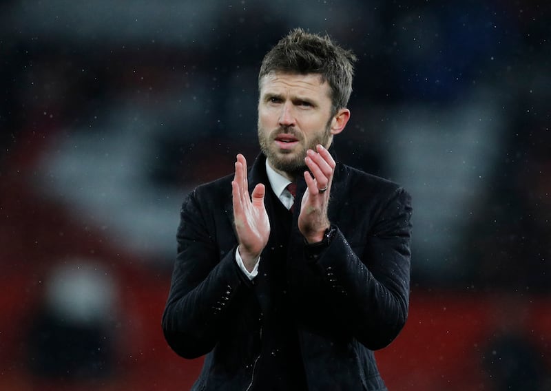 Michael Carrick applauds fans after Manchester United beat Arsenal 3-2 on Thursday, in his last match as the Red Devils' caretaker manager. Reuters