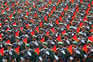 Members of Iran’s Islamic Revolutionary Guard Corps march in Tehran. AP