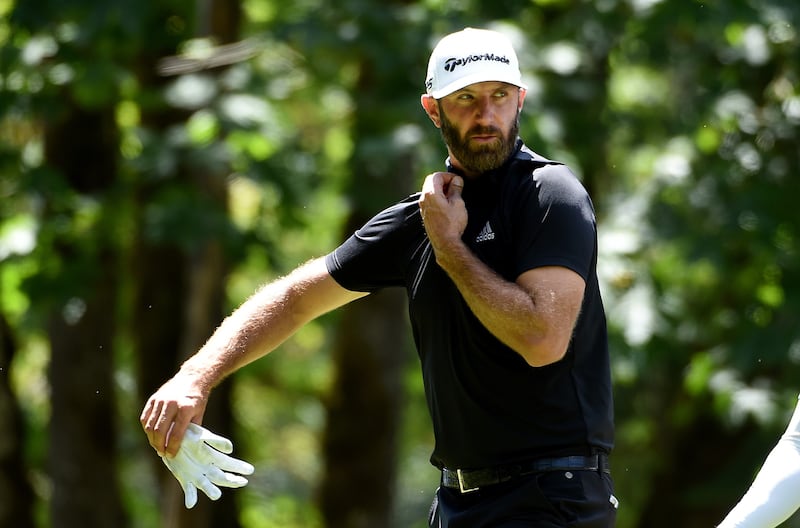 Dustin Johnson walks up to the tee box on the fourth hole during round two of the LIV Golf Invitational - Portland. AFP
