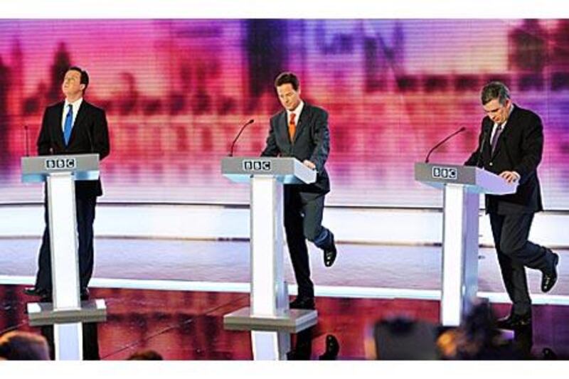 From left, the Conservative leader David Cameron, left, the Liberal Democrat Party leader Nick Clegg, and the Labour leader Gordon Brown take part in Britain's third televised election debate  in Birmingham.