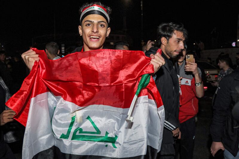 Thousands of fans took to the streets after the match, waiving the Iraqi flag and dancing. AFP