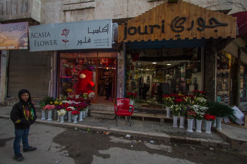 Shops selling gifts and roses in Idlib.