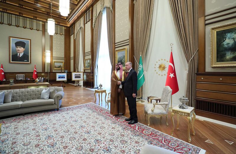 Turkey's President Recep Tayyip Erdogan (R) posing with Crown Prince of Saudi Arabia Mohammed bin Salman (L) during an official ceremony at the Presidential Complex in Ankara. AFP