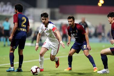 Igor Coronado, second left, goes on the attack during the game between Sharjah and Al Wahda in the Arabian Gulf League last season. Chris Whiteoak / The National