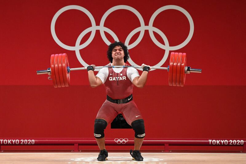 Qatar's Fares Ibrahim Elbakh won gold in the men's 96kg weightlifting.