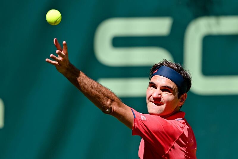 Roger Federer serves to Ilya Ivashka during their Halle Open first round match. Getty Images