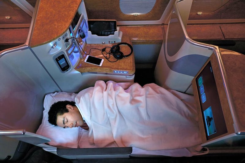 The Emirates A380 800 business class cabin with lie-down bed. Courtesy Emirates