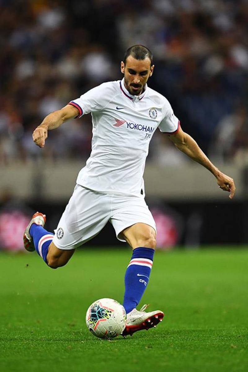 Chelsea's defender Davide Zappacosta passes the ball during a football friendly match between Spanish Liga team Barcelona and English Premier League club Chelsea in Saitama on July 23, 2019. (Photo by CHARLY TRIBALLEAU / AFP)