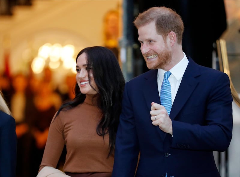 Britain's Prince Harry and Meghan, Duchess of Sussex leave after visiting Canada House in London after their recent stay in Canada. AP Photo